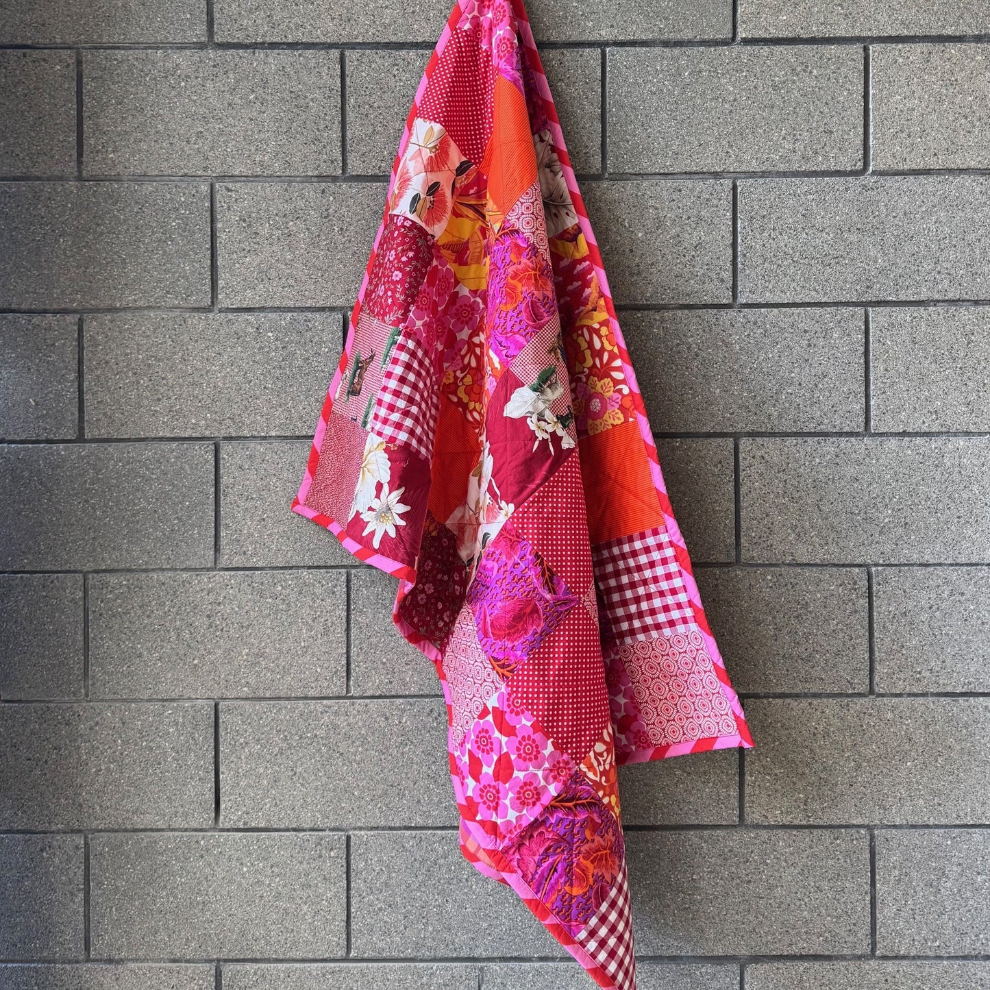 "In the Red" New and Upcycled Fabric Sofa Quilt