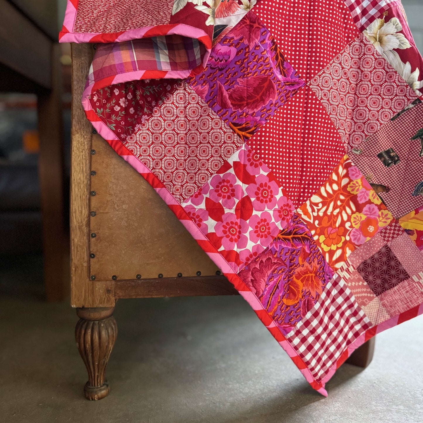 "In the Red" New and Upcycled Fabric Sofa Quilt
